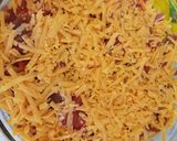 A picture of step 5 of Layered Chicken, mushroom and Parma ham bake 😀.