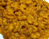 A picture of step 7 of Turmeric Porridge Beans and Rice.