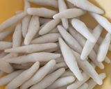 A picture of step 2 of Steamed rice cigars (Fara).