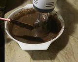 A picture of step 4 of Black forest chocolate sponge cake.