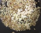 A picture of step 2 of Makai Dum Masala.