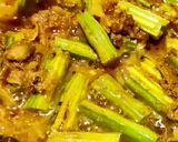 A picture of step 4 of Vegetarian fish with banana curry.