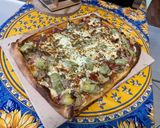 Une image de l'étape 14 de Pizza jambon tomate artichaut champignons emmental et mozzarella.