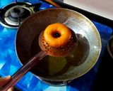 A picture of step 7 of Spider-web Glazed Donuts 🍩.