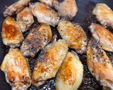 A picture of step 5 of Japanese Teriyaki Chicken with pepper and sesame.