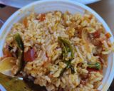 A picture of step 3 of Tomato onion rice for lunch.