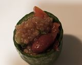 A picture of step 7 of Mexican quinoa salsa in cucumber pockets.