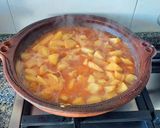 Foto del paso 8 de la receta Gambas al fish masala con patatas confitadas en fumet de gambas