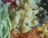 A picture of step 3 of Veggies yogurt with cucumber garnishing.