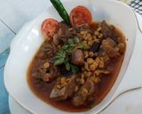 A picture of step 7 of چنا دال گوشت.