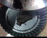 A picture of step 2 of Oreo cheese cake.