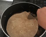 A picture of step 4 of Baked Mussakhan on bread.