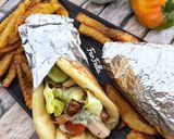 صورة لخطوة 12 من وصفة ساندوتشات شاورما الدجاج اليونانية Gyro 🇬🇷