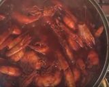 A picture of step 11 of Camarones a la Diabla.