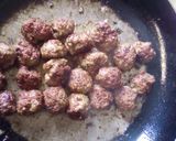 A picture of step 7 of Meat balls and beef sausages bitings in sauce.