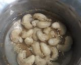 A picture of step 4 of Chicken Aloo in white gravy.