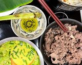 A picture of step 2 of Quick and Easy Bánh Xèo on a Rainy Day with a Nonstick Pan.