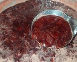 A picture of step 2 of Home made strawberry syrup.