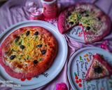 صورة لخطوة 8 من وصفة بيتزا وردية بعجينة الشمندر(بيطراف)