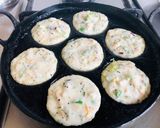 A picture of step 12 of Vegetables Oats Suji Paniyaram.