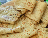 A picture of step 4 of Layered Chapatis with tea.