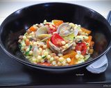 A picture of step 6 of Fregola Sarda with Clams, Bell Pepper, and Roasted Datterini Tomatoes.