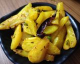 A picture of step 3 of Jeera aloo matar fry without onion garlic.