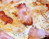 Foto del paso 7 de la receta: Milanesa a la napolitana con cebollas caramelizadas