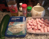 Foto del paso 1 de la receta: Salchichas minis con gulas al ajillo y calabacín al horno