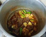 A picture of step 7 of Aalu gosht (mutton/beef).