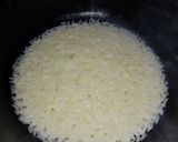 Foto del paso 4 de la receta: Arroz blanco salteado en mantequilla al ajillo
