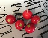 Une image de l'étape 8 de Melon farci aux tomates bicolores, feta, radis et menthe fraîche.