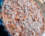 صورة لخطوة 3 من وصفة طورطة جوز الهند والتفاح واللوز