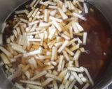 A picture of step 8 of Lumpia Basah Bandung.