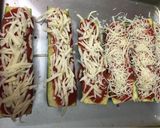 A picture of step 5 of Zucchini Pizza Boats.