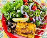 A picture of step 4 of Tofu and Shiitake Satay with Massaman Curry Satay Sauce and Salad.