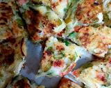 A picture of step 5 of Bread uttapam.