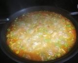 Foto del paso 13 de la receta Arroz con carne de conejo, pollo y costillas de cerdo
