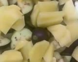 A picture of step 6 of Achari Aloo Baingan.