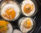 A picture of step 4 of Baked Eggs with Mushrooms, Comté, and Chives.