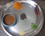 A picture of step 4 of Oats Semolina Uttapam with idli and Sambhar.