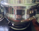 A picture of step 10 of One-pot Vatha kuzhambu rice.