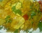A picture of step 2 of NepalI style potato fry.