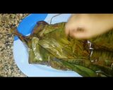 A picture of step 8 of Meen pollichathu/ Fish fried in banana leaf wrap.