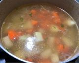 Hình bước làm 4 của món Canh Khoai Tây, Cà Rốt, Su Hào Nấu Mộc