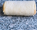 Foto del paso 2 de la receta: Rollitos de pan de molde con jamón y queso