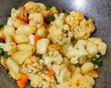 A picture of step 2 of Dabha Style Cauliflower Mix Veg.