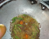 A picture of step 3 of Khatti-Mithi Fried Idlis.