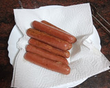 Foto del paso 1 de la receta: Perrito caliente cebolla crujiente y queso rallado