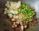 A picture of step 2 of Green chana potato curry.